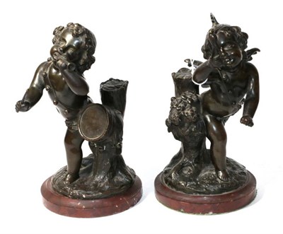 Lot 110 - A pair of bronze figures of Putti, French, late 19th century, one playing a drum and pipes, the...