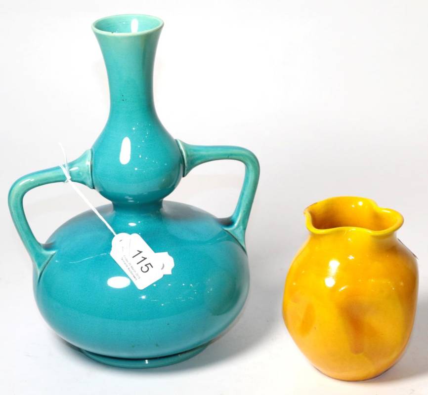 Lot 115 - A Burmantofts turquoise glazed twin-handled double gourd vase, number 194 25cm high, together...