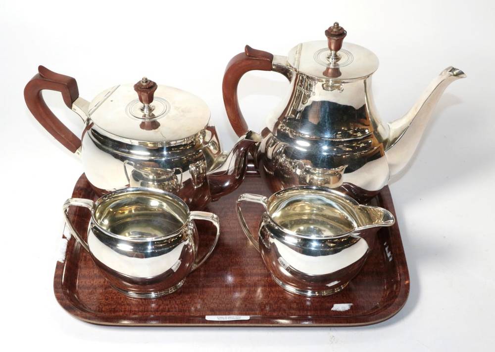 Lot 124 - A silver four piece tea and coffee service, Roberts & Belk, Sheffield 1963, of plain oval...