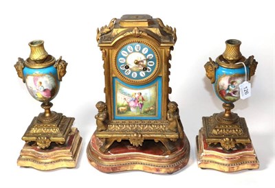 Lot 126 - A Continental gilt metal and Sevres style porcelain clock garniture, circa 1890