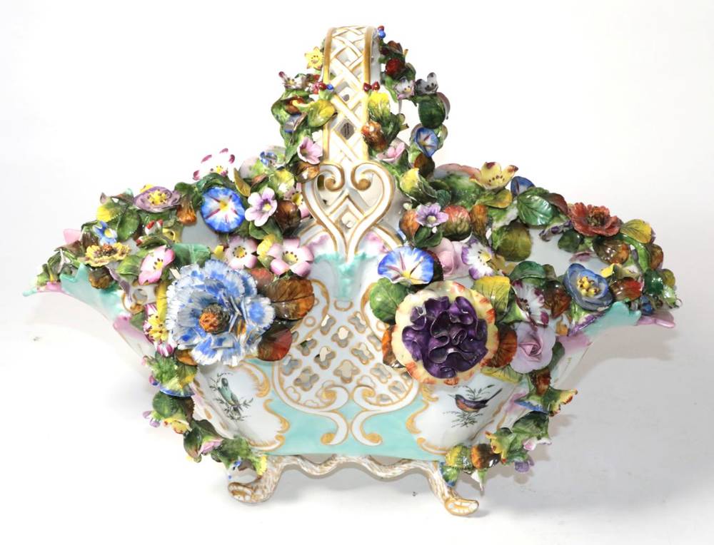 Lot 130 - A Meissen style floral encrusted porcelain basket, bearing pseudo cross-sword mark (some damage)