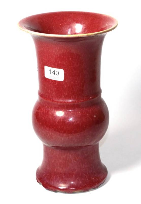 Lot 140 - A Chinese sang de boeuf Gu vase, 30cm high