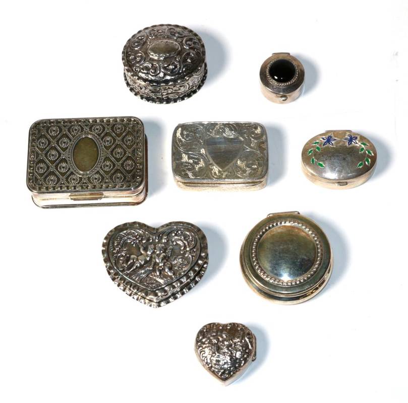 Lot 153 - Eight various modern silver pill boxes, some with repousse decoration and including two heart...