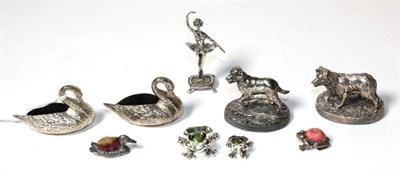 Lot 166 - A group of modern silver small items comprising: two swan pin cushions; two graduated silver...