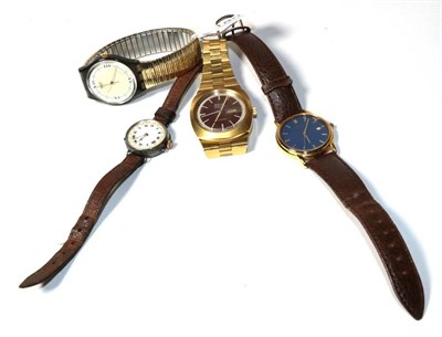 Lot 180 - A plated day/date automatic wristwatch signed Bulova Ambassador, Swatch wristwatch, Pulsar...
