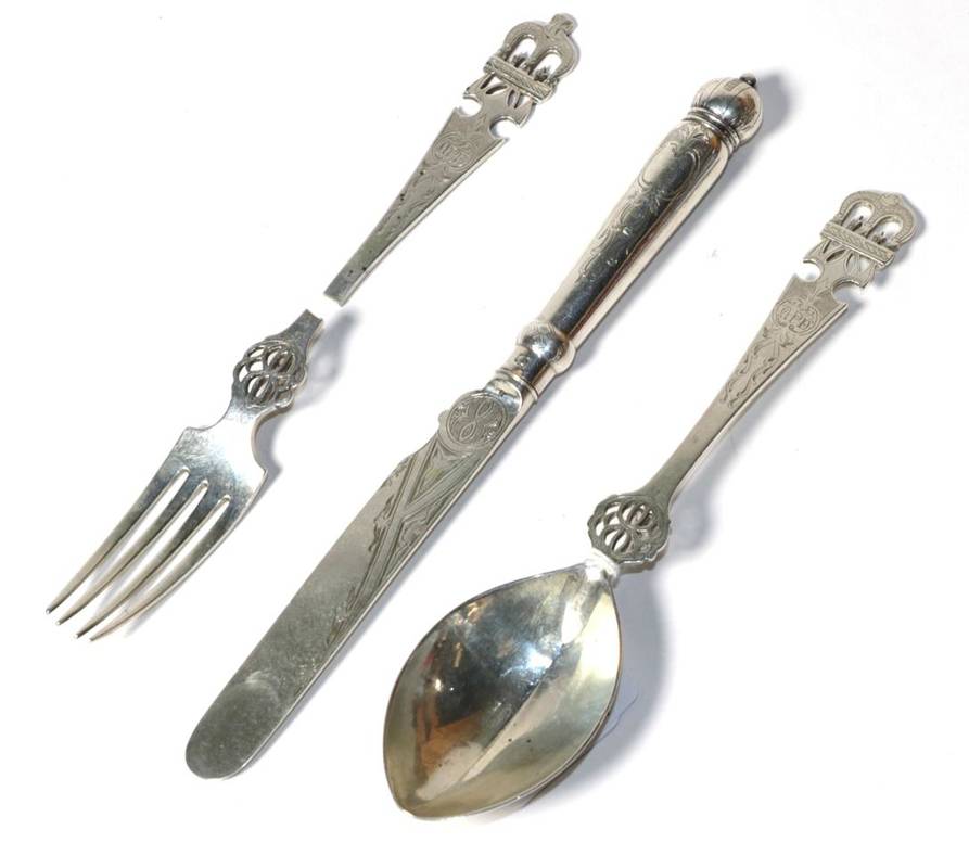Lot 187 - A Victorian Gothic revival Christening knife, fork and spoon set, Henry Wilkinson & Co,...