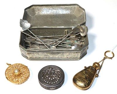 Lot 188 - A 19th century base metal tobacco box with engraved decoration; a quantity of Indonesian white...