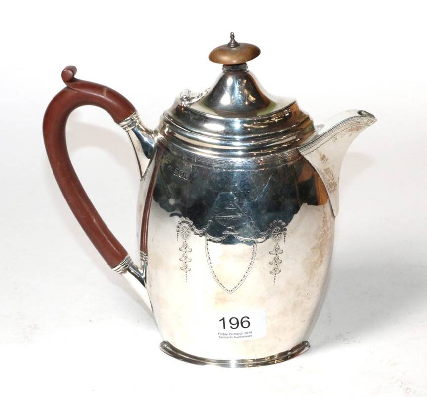 Lot 196 - An Edwardian silver hot water jug, Edward Barnard & Sons, London 1905, navette form with...