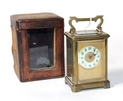 Lot 201 - Brass carriage timepiece, with outer travelling case