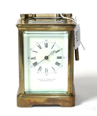 Lot 208 - A striking brass carriage clock, with white enamel dial, retailed by ''C.H. & C. Cowland,...