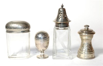 Lot 215 - A Victorian silver pepperette, London 1878, a silver pepper grinder, Birmingham 1979, toilet...