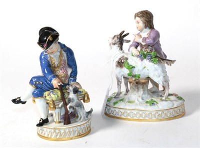 Lot 234 - A Meissen porcelain figure of a huntsman, late 19th century, sitting on a stool holding a...