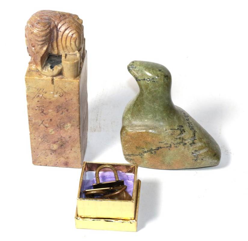 Lot 239 - A Chinese soapstone seal with elephant knop, and a set of four Japanese inlaid menu holders,...