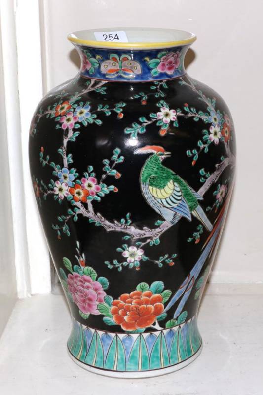 Lot 254 - A Chinese famille noir vase