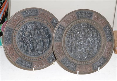 Lot 255 - A pair of Indian brass plaques applied with deities in silver