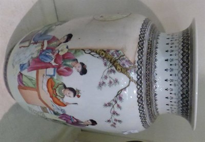 Lot 257 - A 20th century Oriental vase decorated with figures; together with a bronze twin handled vase