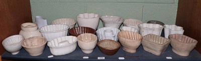 Lot 268 - A collection of seventeen pottery jelly moulds, 19th and 20th century, including examples...