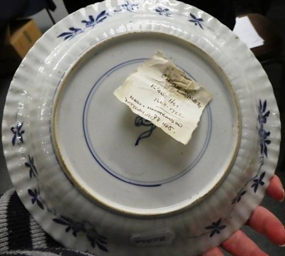 Lot 286 - An 18th century Chinese blue and white porcelain tea bowl and saucer, decorated with a band of...
