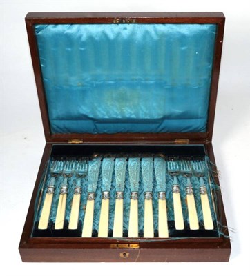 Lot 297 - Twelve pairs of Victorian silver fish knives and forks, John Edward Bingham, (Walker & Hall),...