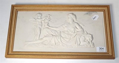 Lot 304 - A reconstituted marble plaque in the classical taste, the reverse inset with a bronze medallion