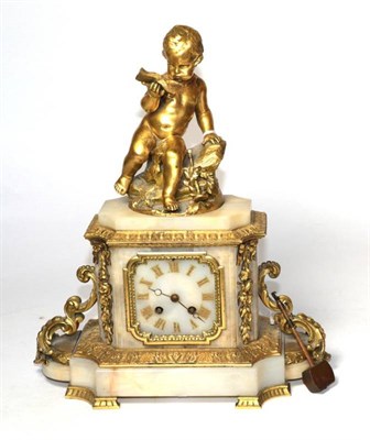 Lot 320 - An alabaster and gilt bronze striking mantel clock, surmounted by a Cherub