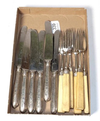 Lot 339 - A set of six silver table knives, makers mark TH, Sheffield 1777, with later steel blades; and...