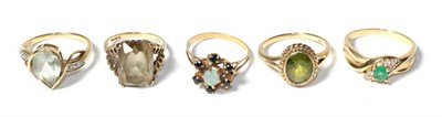 Lot 340 - Three 9 carat gold gem set dress rings, finger sizes L, Q1/2 and R; together with an sapphire...