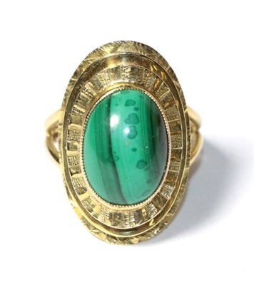 Lot 344 - A 9 carat gold malachite dress ring, finger size L1/2