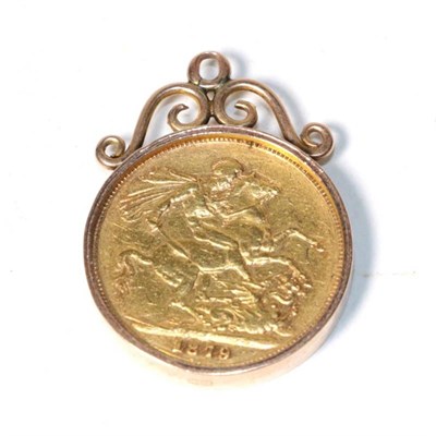 Lot 353 - A full gold sovereign dated 1879 in a mount stamped '9ct'