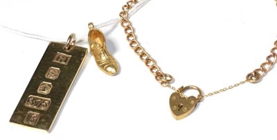 Lot 354 - A 9 carat gold ingot pendant, measures 1.6cm by 4.1cm; a curb link bracelet, stamped '9' '375',...