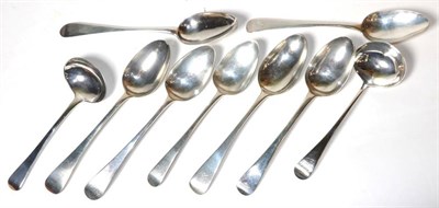 Lot 359 - A group of seven various George III Old English pattern silver table spoons, various dates and...