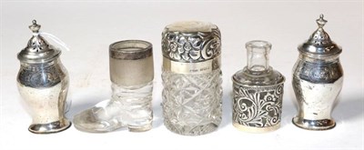 Lot 384 - A novelty silver mounted glass boot match striker, Robert Pringle, London 1900; a pair of...