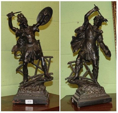 Lot 419 - A pair of patinated spelter figures of Viking warriors, 51cm high (2)