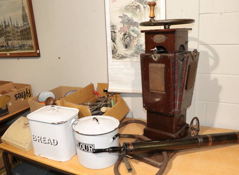 Lot 1081 - Quantity of kitchenalia and other items including enamel tins, an early Volvac vacuum cleaner,...