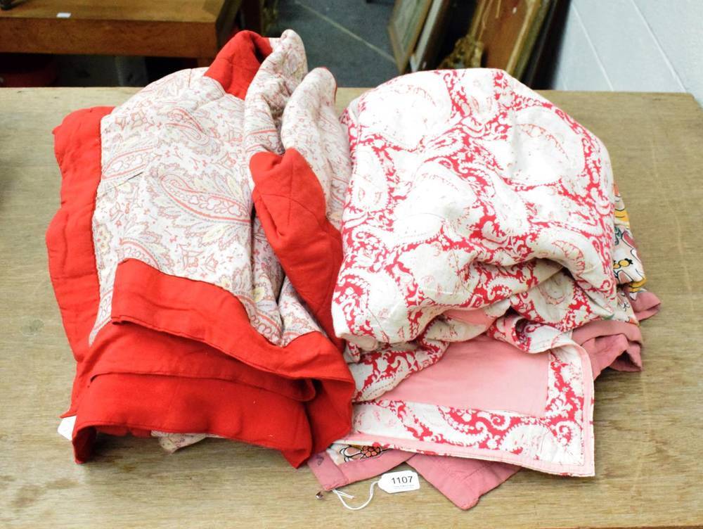 Lot 1107 - Circa 1930s printed cotton whole cloth quilt with pink mounts, earlier turkey red and paisley...
