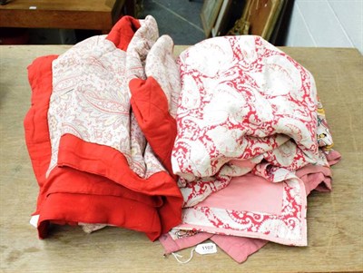 Lot 1107 - Circa 1930s printed cotton whole cloth quilt with pink mounts, earlier turkey red and paisley...