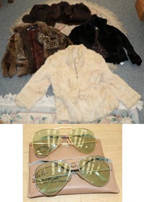 Lot 1131 - Three fur jackets and a wrap; together with two pairs of circa 1960s/1970s Ray Ban sunglasses, with