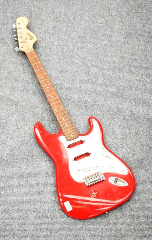 Lot 1136 - A Fender Squier Strat electric guitar