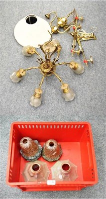 Lot 1142 - A six light brass chandelier, a four light chandelier with marble glass shades and a twin light...