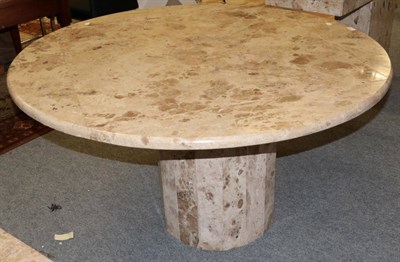 Lot 1163 - A Travatine circular dining table, modern, on a cylindrical base, matching the preceding lot, 134cm