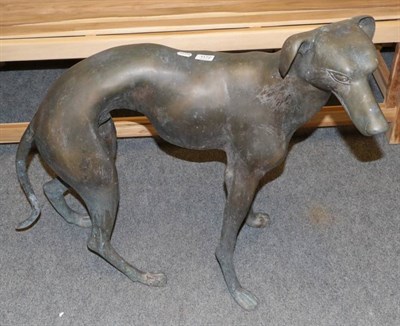Lot 1172 - A cast metal figure of a greyhound (modern)
