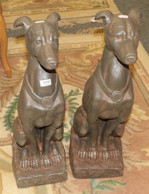 Lot 1173 - Pair of reproduction models of dogs