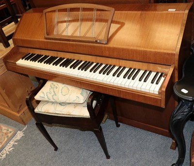 Lot 1208 - An Evestaffe 1930s walnut cased mini overstrung piano, 140cm by 52cm by 98cm; and an early 20th...