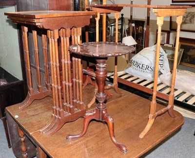 Lot 1213 - A nest of three mahogany tables; a rectangular table from a nest; a George V inlaid folding...
