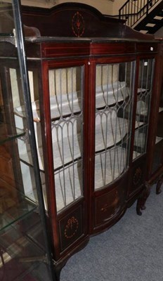 Lot 1215 - An Edwardian inlaid mahogany display cabinet with leaded glass doors
