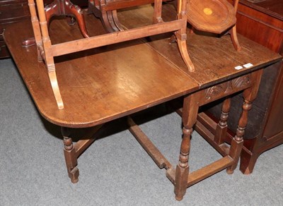 Lot 1219 - Carved oak gate-leg table, in the 17th century style