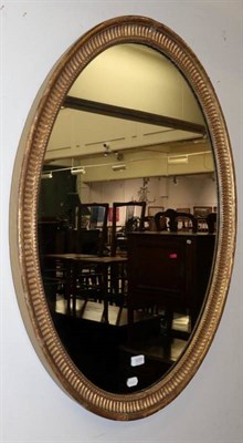 Lot 1233 - A gilt framed oval mirror
