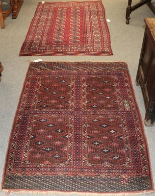 Lot 1266 - Afghan Tekke rug, the claret field with two columns of quartered guls enclosed by multiple borders