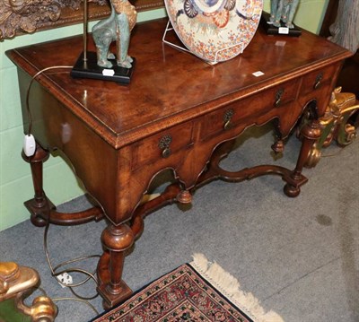 Lot 1272 - William & Mary style walnut and featherbanded dressing table, with three drawers, 110cm by...