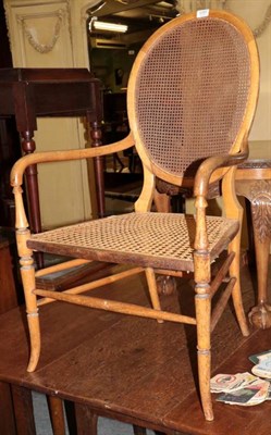 Lot 1291 - A cane seat open chair